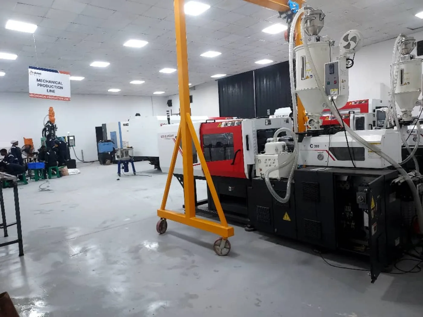 AmalTech's mechanical production line with injection-moulding equipment for device housings