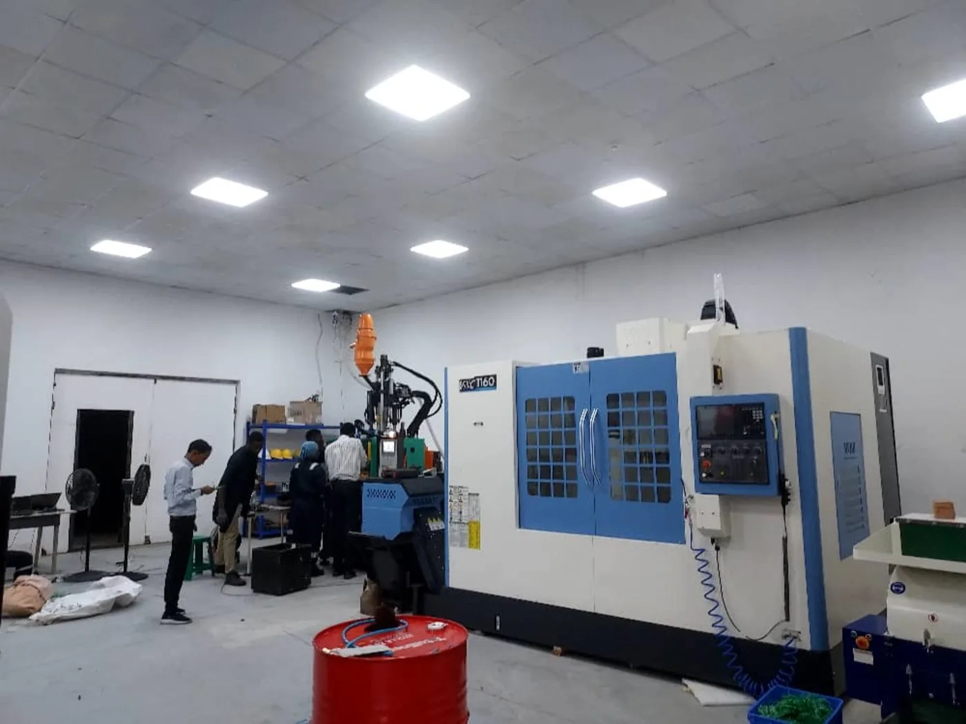 AmalTech engineers working on the mixed production line for connected devices